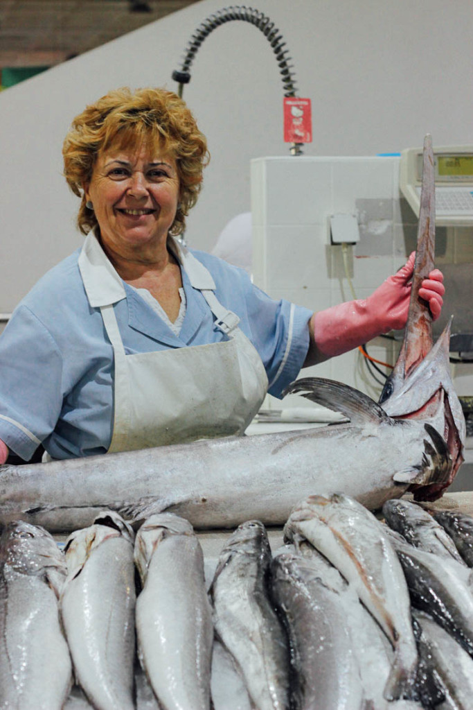 Behind the fish counter.